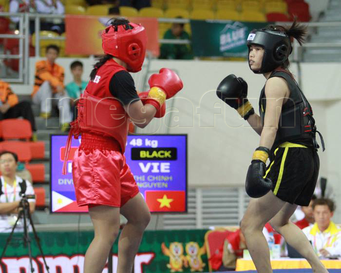 Nguyễn Thị Chinh đã nén đau mang về thêm cho đoàn thể thao VN một tấm HCV